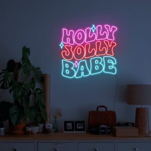 holly jolly Christmas neon sign in pink, red and ice blue colour