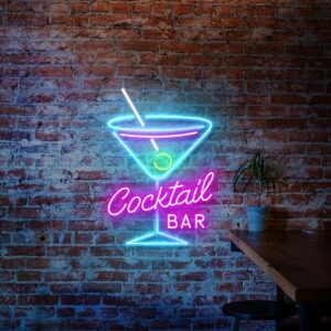 "Cocktail" neon sign with a brightly lit glass and multiple colours, against a dark background
