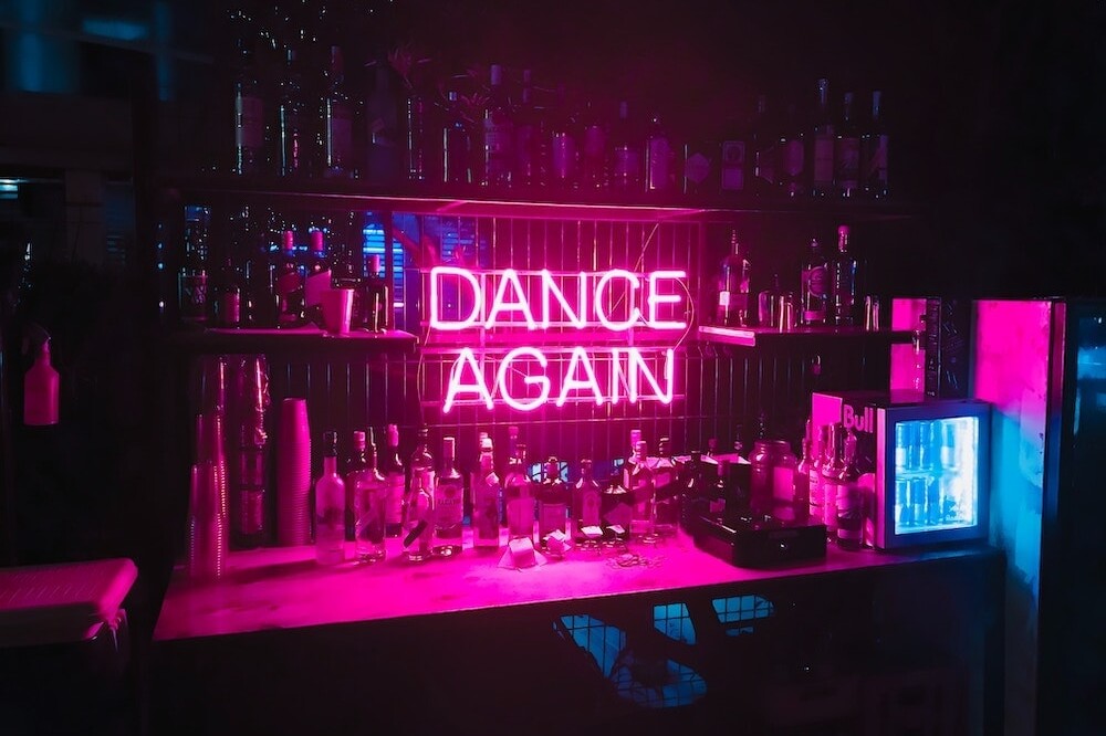 dance again pink bar glass neon sign