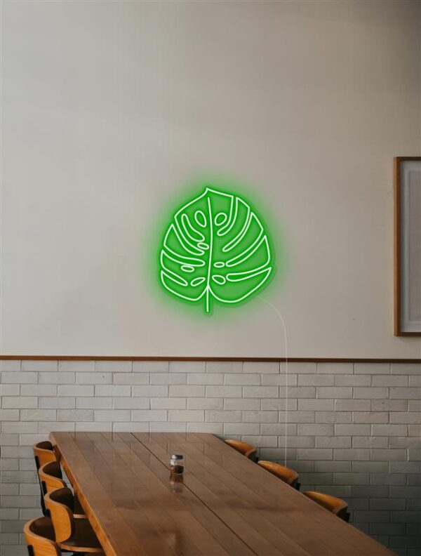 Monstera neon light restaurant decor