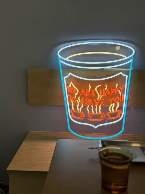 We Are Happy To Serve You paper coffee cup neon sign