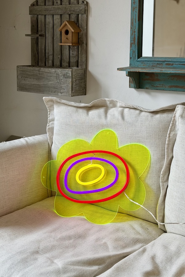 flower neon sign with yellow acrylic board