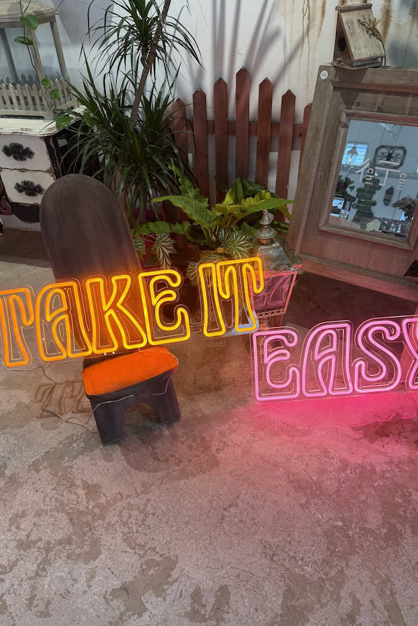 take it easy orange and pink neon sign